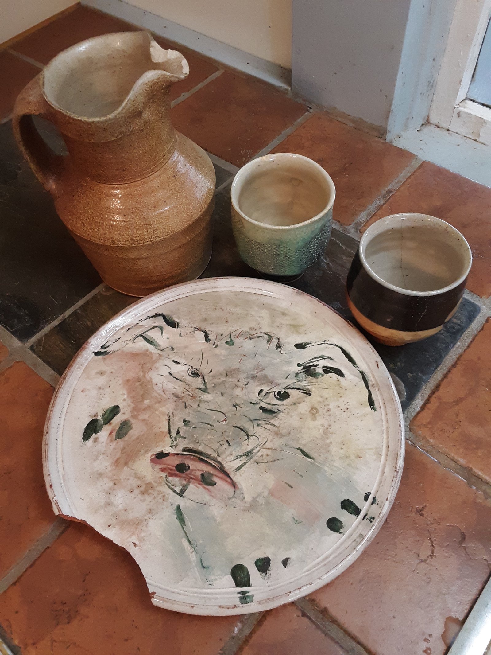 My most used plate (Ron Meyers) is surrounded by broken and chipped Michael Simon pots. Photo Credit: Carter Gillies
