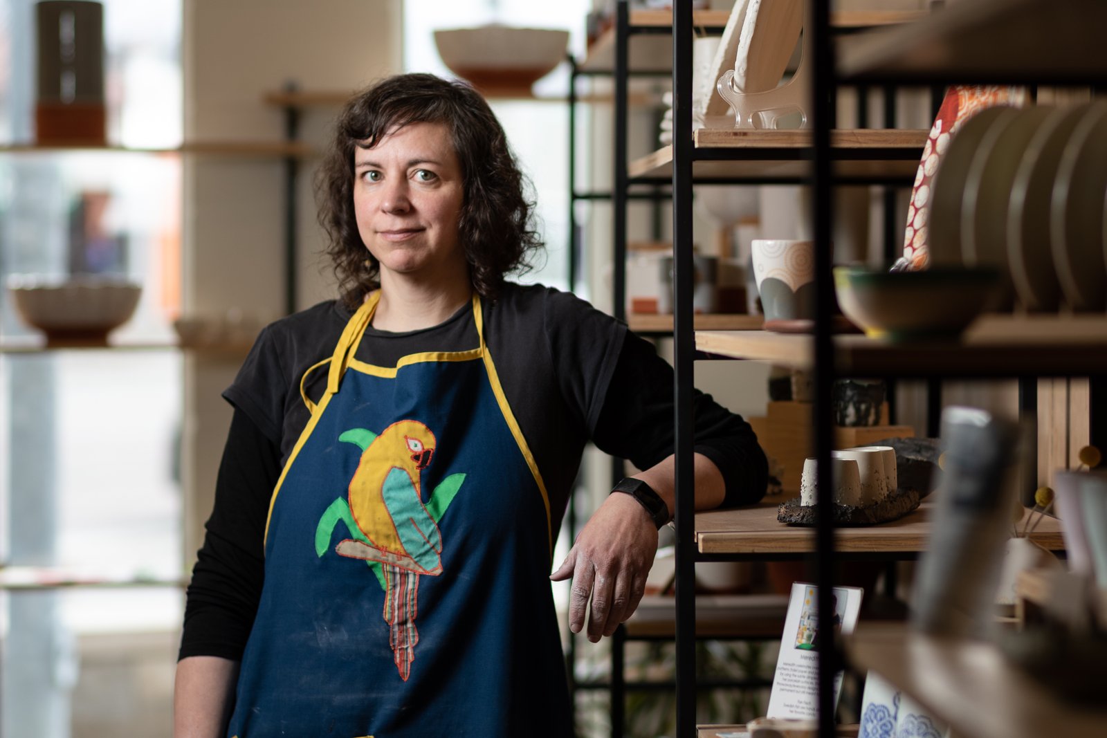 Chandra DeBuse in the front gallery of KC Urban potters, Kansas City, Missouri. Photo Credit: Paul Andrew Photography