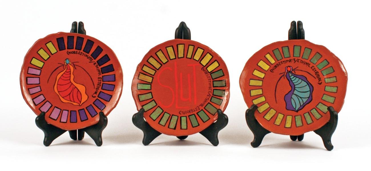 Dani Sigler. Birth Control Plates, 2013. Red Earthenware, underglazes, glazes. 8 x 1.5 in. each. Photo by artist.