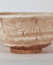 Otagaki Rengetsu: Tea bowl with incised poem. Glazed stoneware, 19th century. Collection of John Fong.
