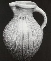 Gallon Pitcher. Kaolin slip drips with celadon glazed neck. 14 in. Wood fired. 1992. Photo Robin Alexander.