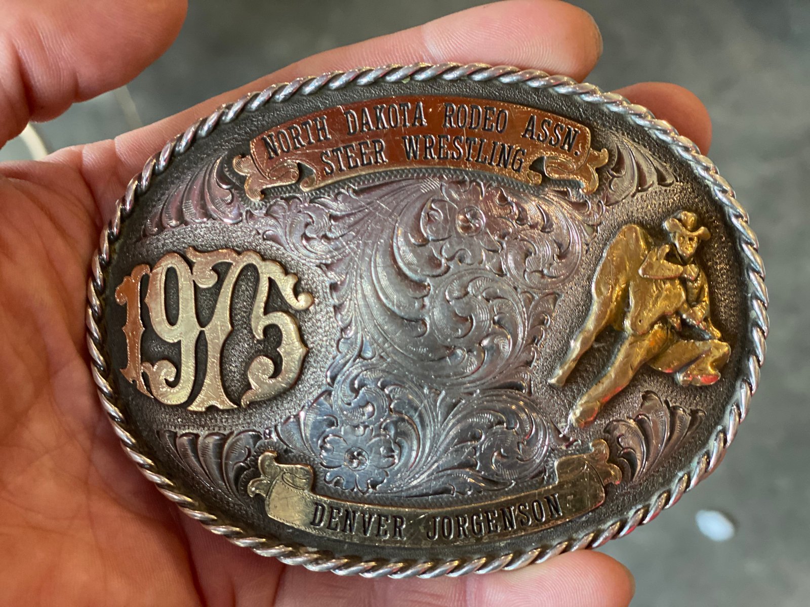 The belt buckle his father won the year he was born. Denver Jorgenson was inducted into the North Dakota Cowboy Hall of Fame in 2017.