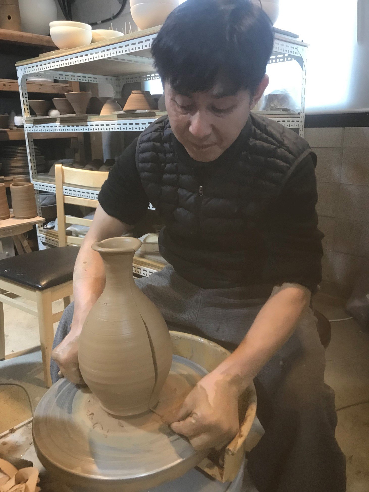 Chul cutting a bottle. Photo credit; Jesse Golden