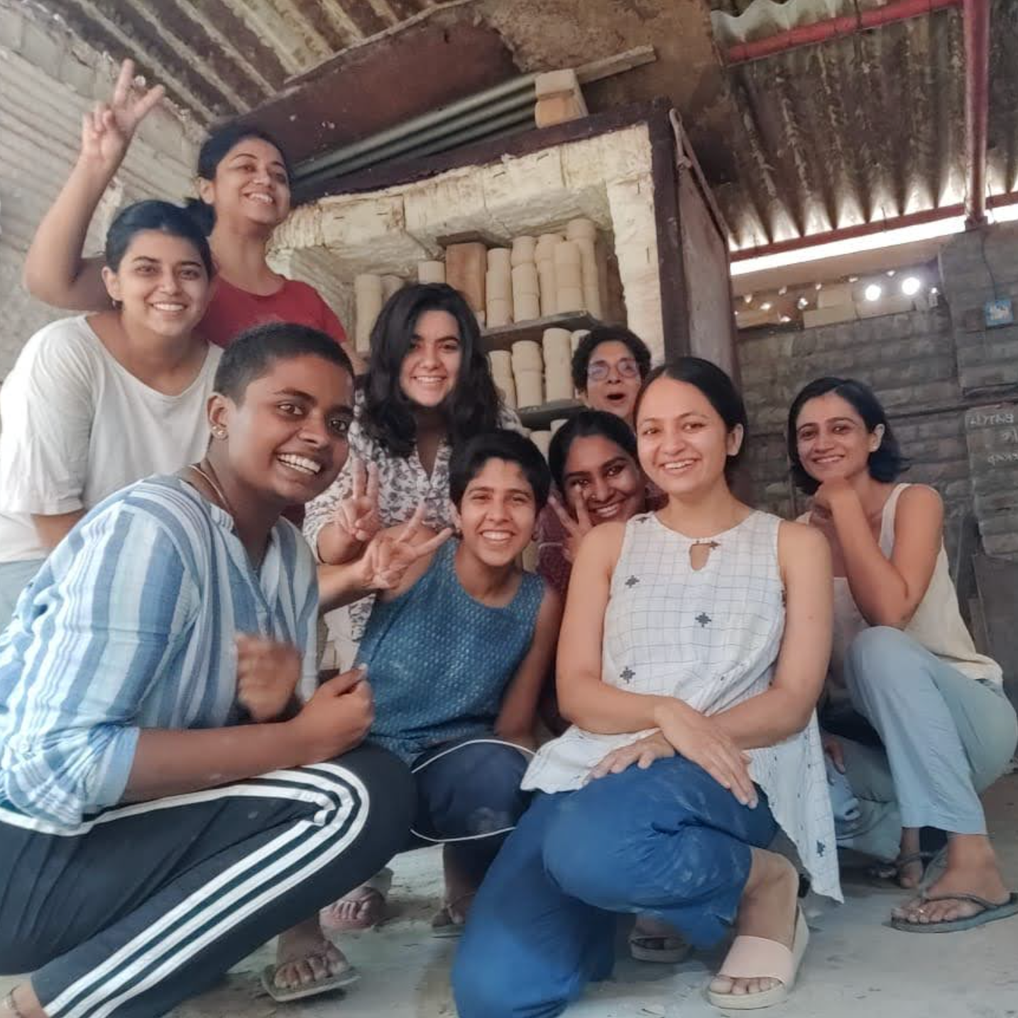 All smiles after loading bisque kiln.