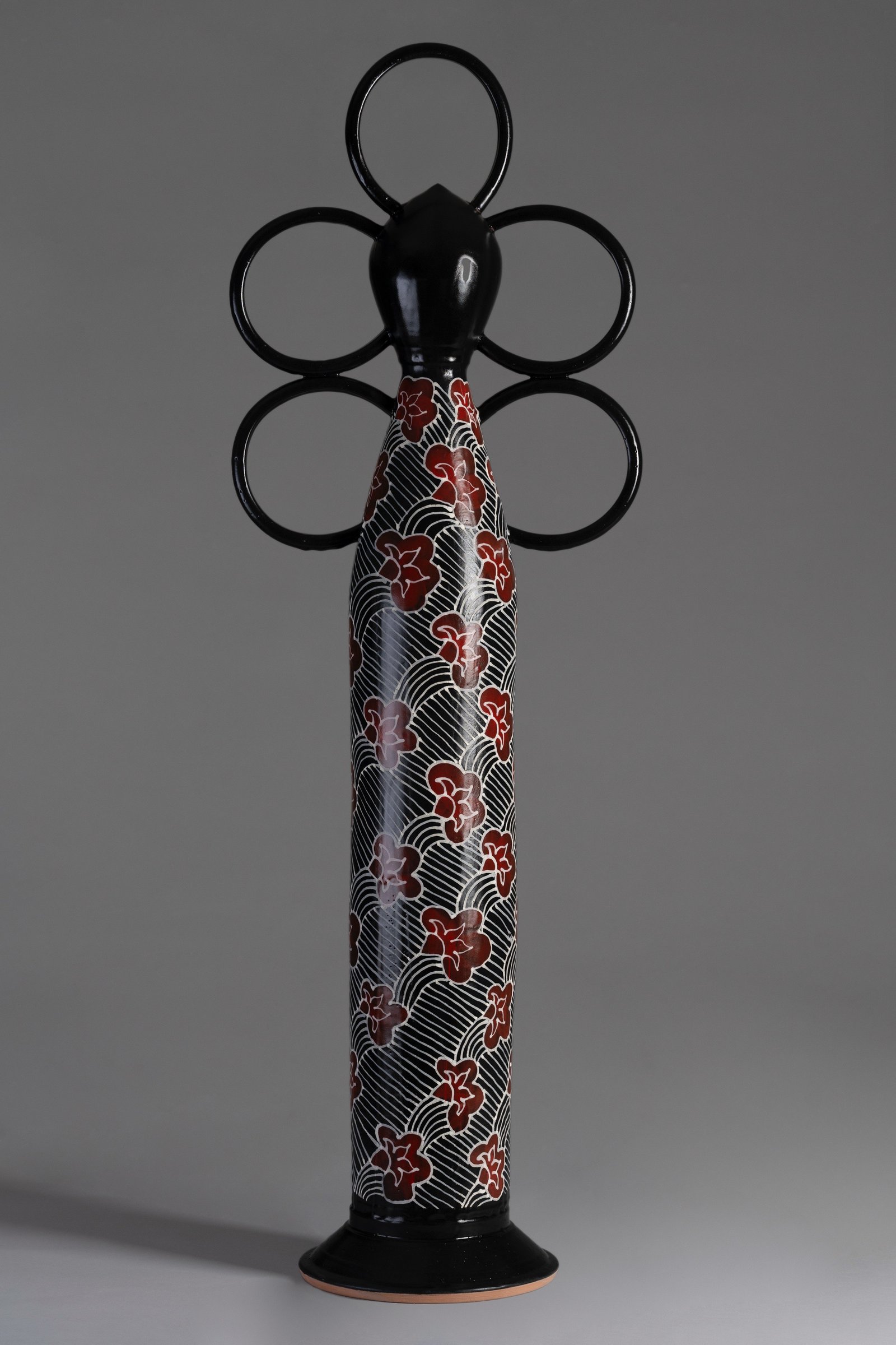 Emmanuel Okechukwu, “Obioma (The Big Heart)”,2025, Ceramic, wheel-thrown and extruded rings, cone 04 clay, majolica glaze and underglaze, 39” × 27”.