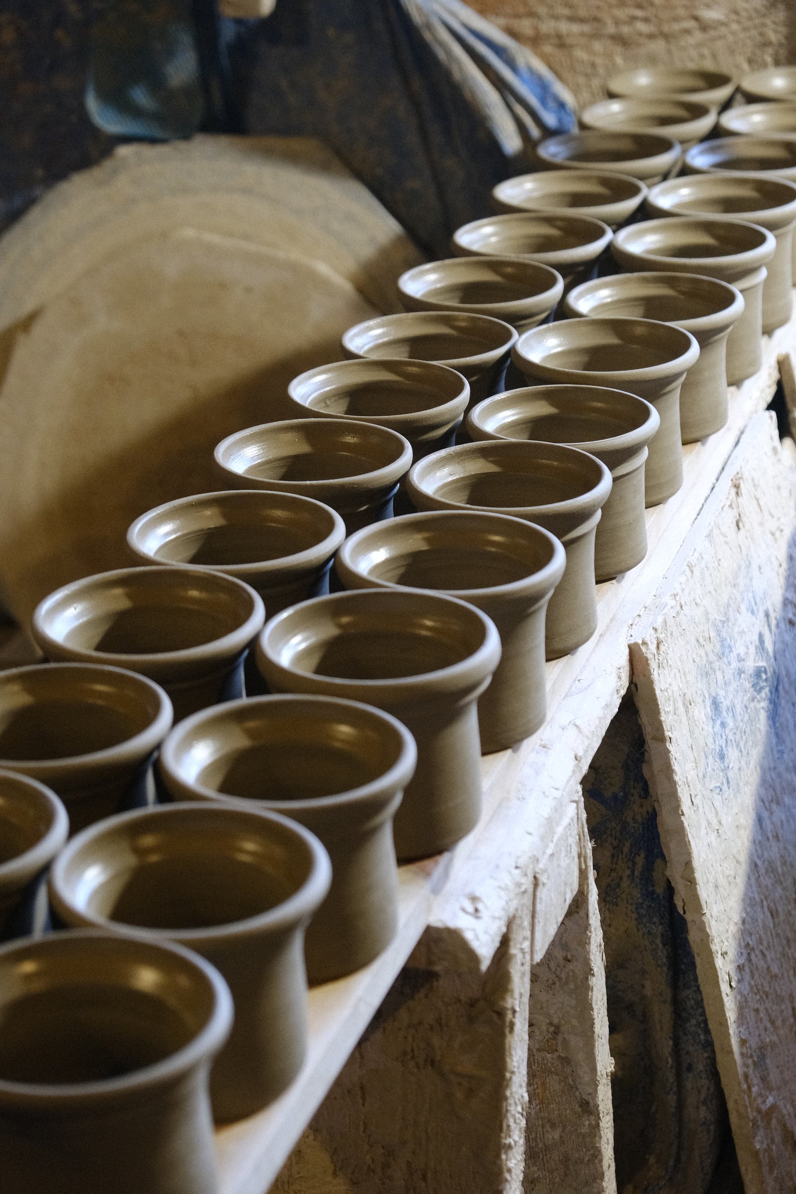Pots at Matt Jones studio.