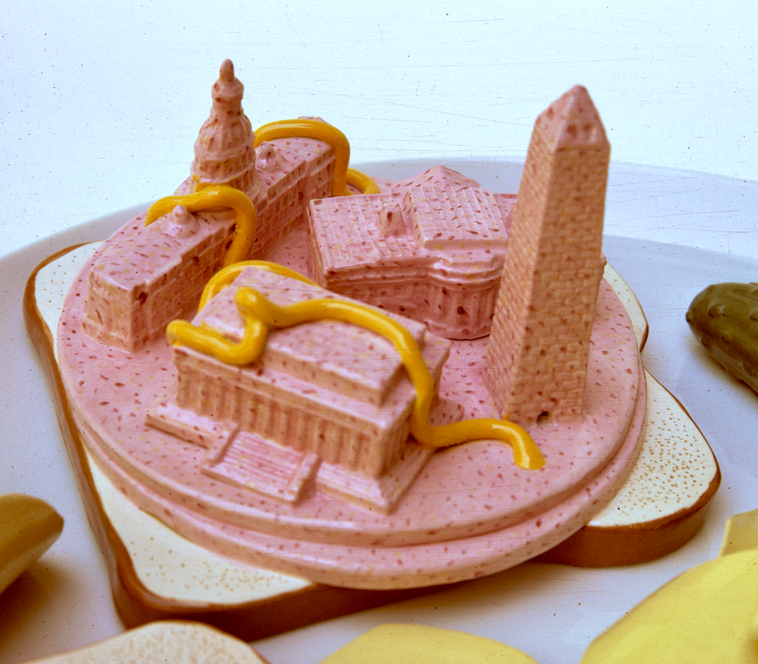 Washington Baloney (detail), 1970, ceramic, glaze 3 x 12 x 12. Photo courtesy of Richard Notkin. Washington Baloney (detail), 1970, ceramic, glaze 3 x 12 x 12. Photo courtesy of Richard Notkin.