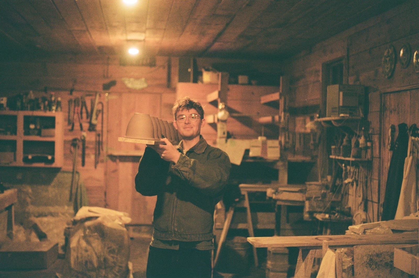 Samuel Harley in the studio, apprenticing with Matt Jones.